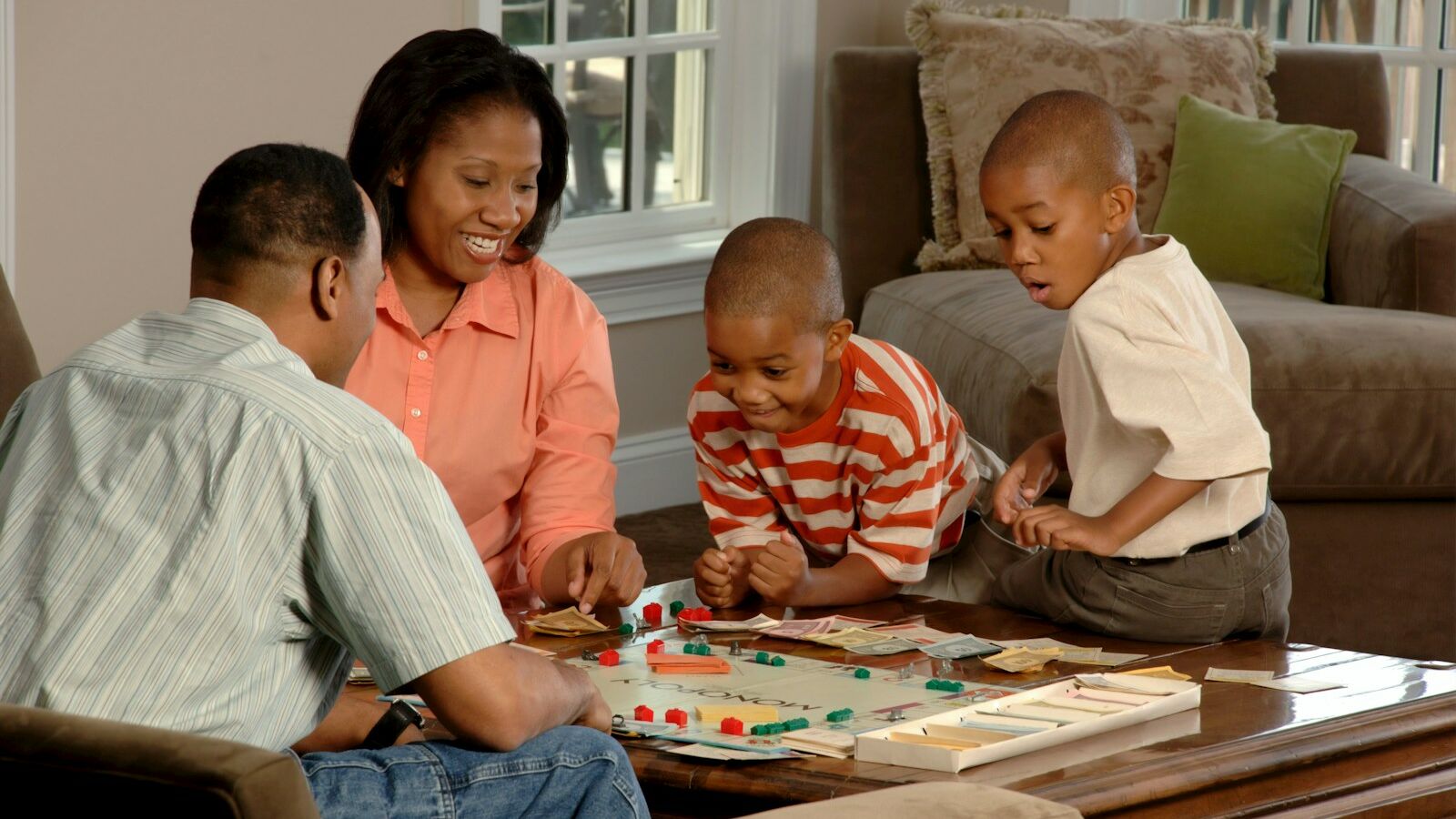 family playing board games