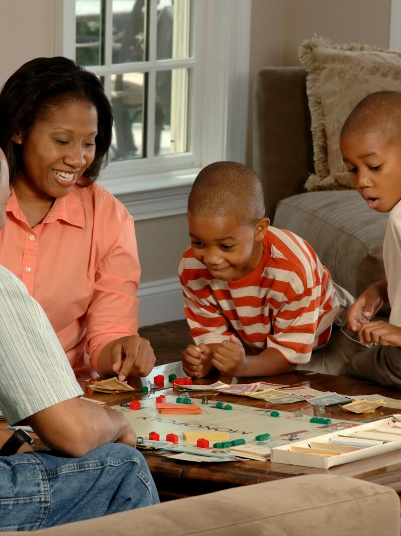 family playing board games