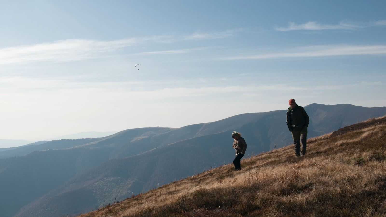 two person climbing mountain