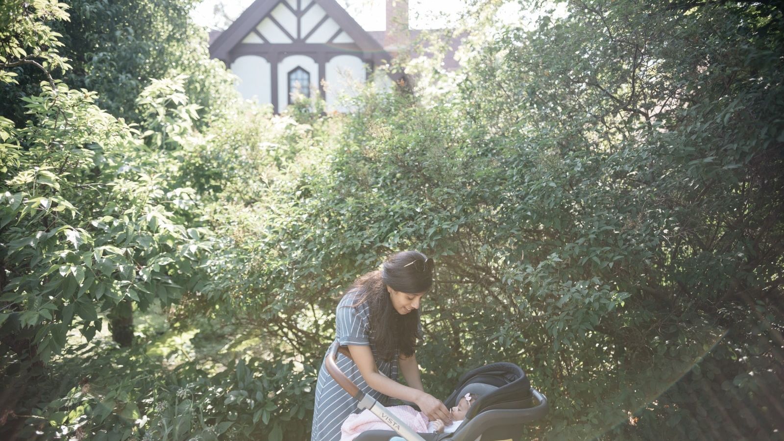 woman standing near stroller