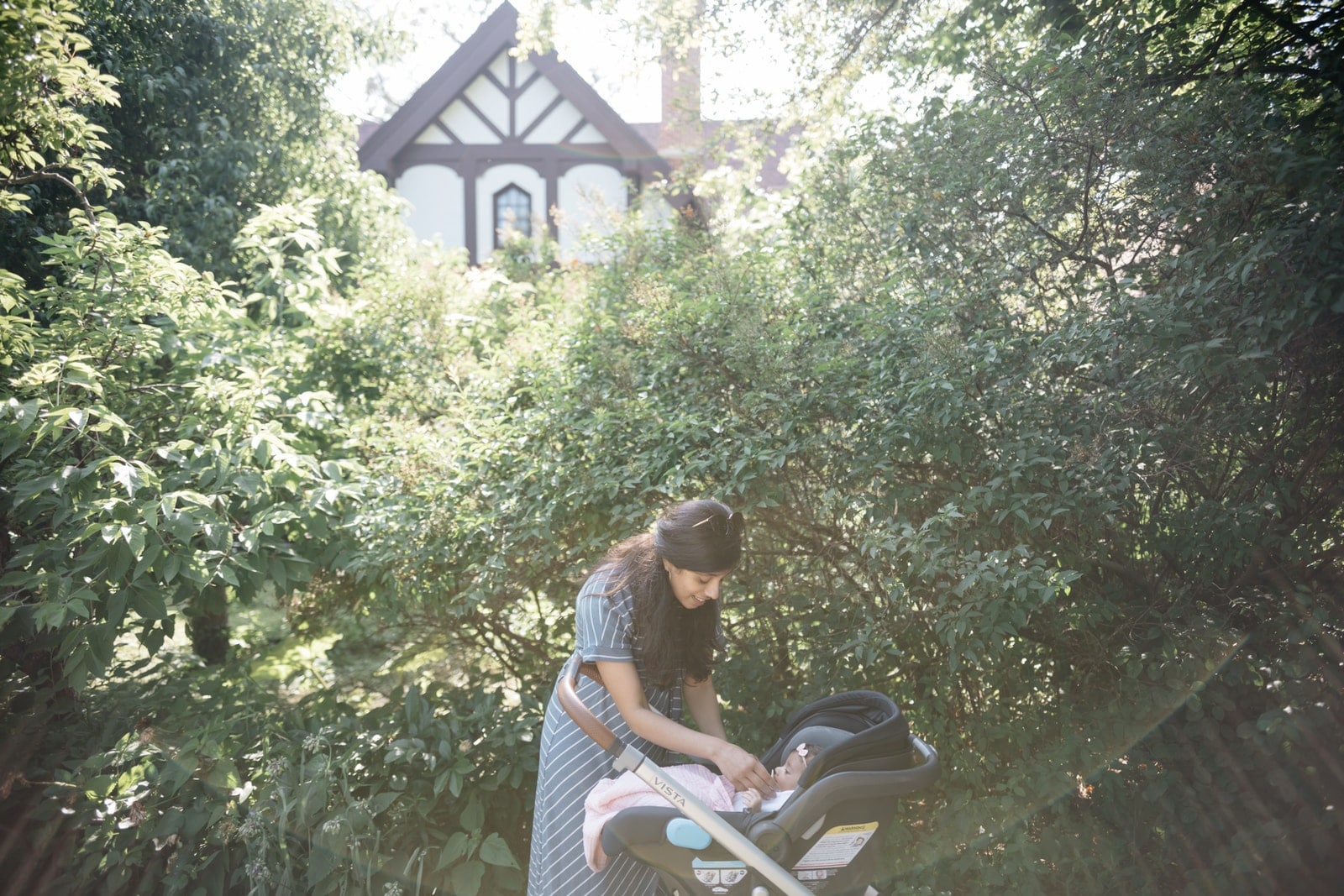 woman standing near stroller