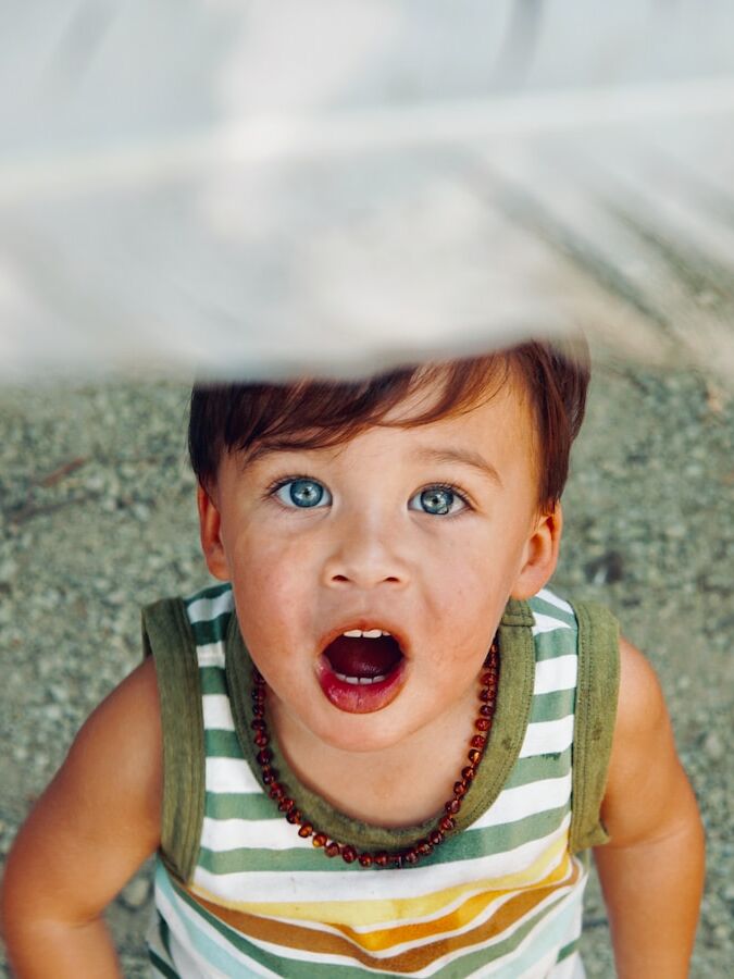 boy wearing tank top