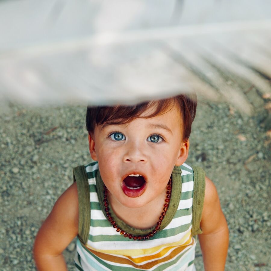 boy wearing tank top